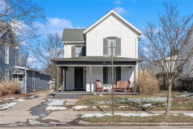 front of property featuring covered porch