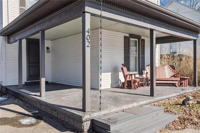 view of patio featuring a porch