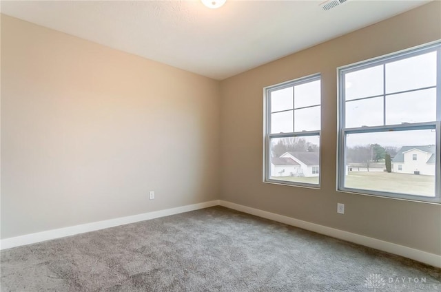 view of carpeted spare room