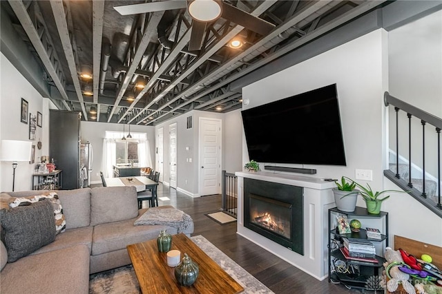 living room featuring dark hardwood / wood-style flooring