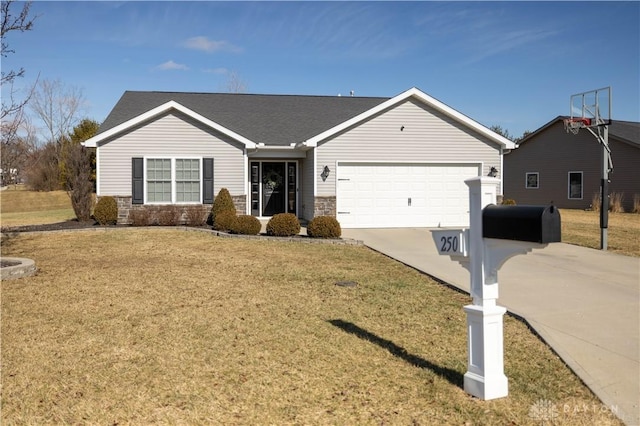 single story home with a garage and a front lawn