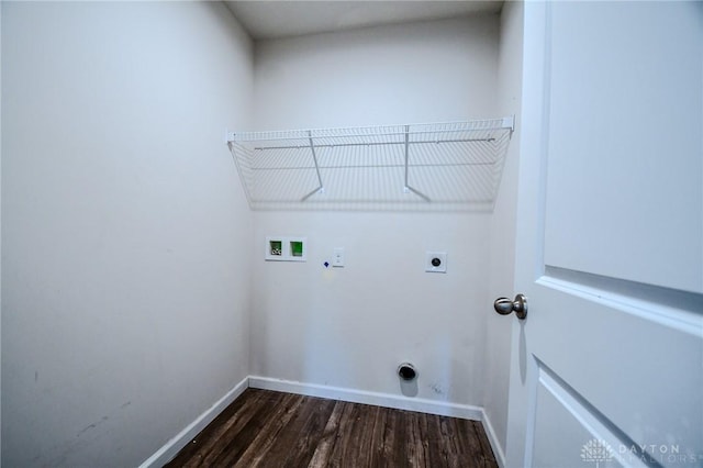 laundry area with electric dryer hookup, washer hookup, dark hardwood / wood-style floors, and gas dryer hookup