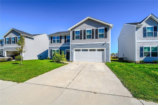 view of front of home featuring a garage and a front yard