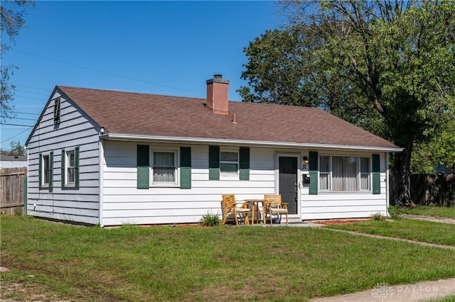 view of front of house with a front lawn