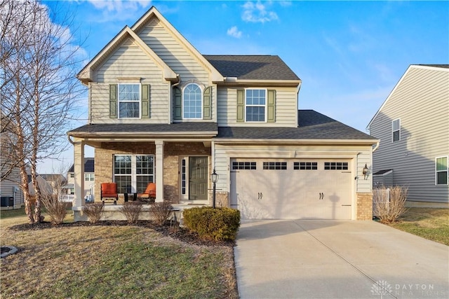 view of front of house featuring a front yard and a porch