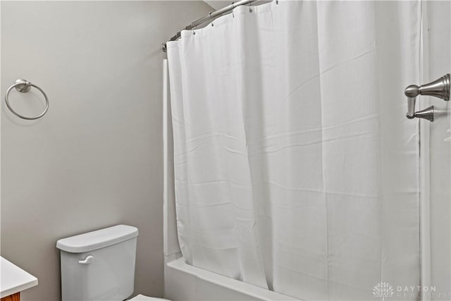 full bathroom with vanity, toilet, and shower / bathtub combination with curtain