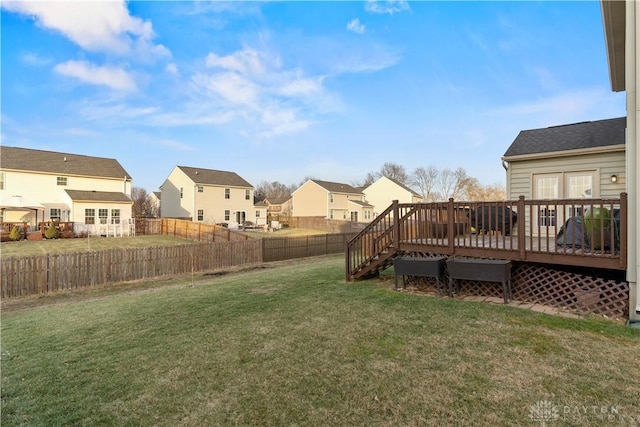 view of yard featuring a wooden deck