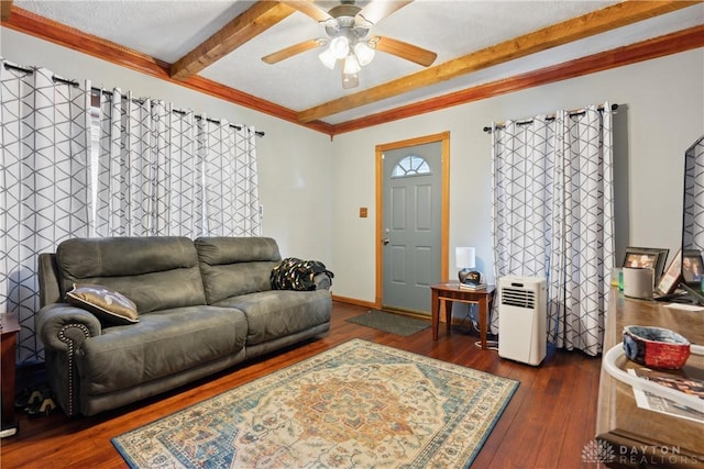 living room featuring ceiling fan, dark wood-type flooring, and beamed ceiling