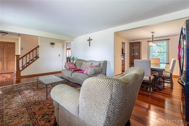 living room with dark wood-type flooring