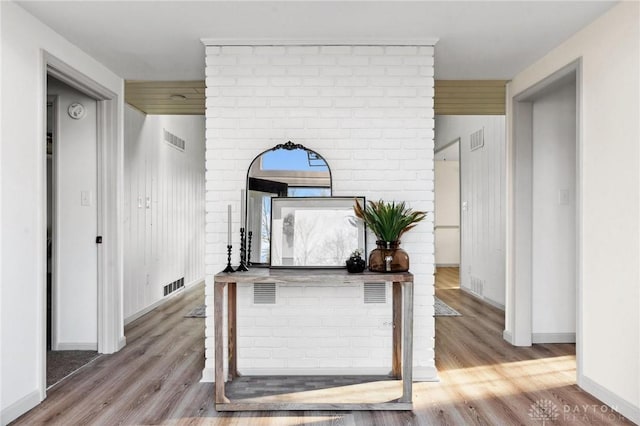 corridor featuring hardwood / wood-style flooring