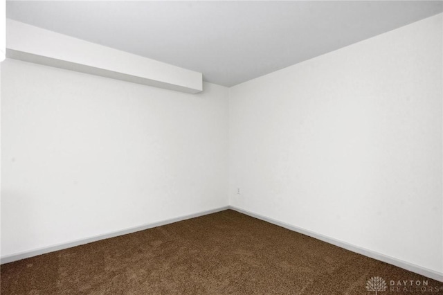 spare room with carpet floors