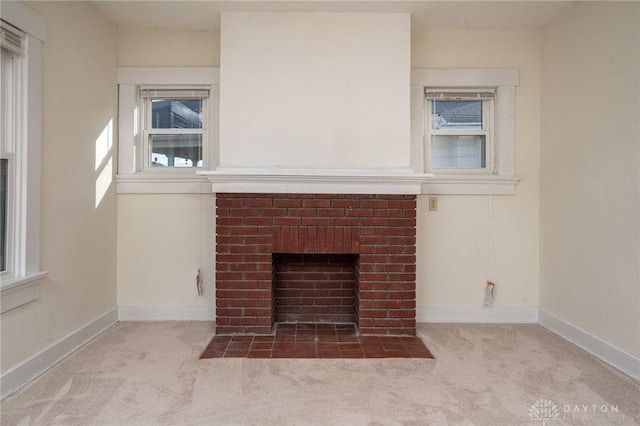 details with a brick fireplace and carpet floors