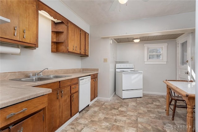 kitchen featuring ceiling fan, sink, and white appliances