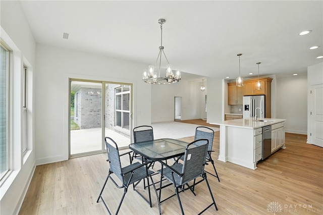 300 Grassy Creek Way, Washington Twp, OH 45458 - dining area with a chandelier, light wood-style floors, recessed lighting, and baseboards