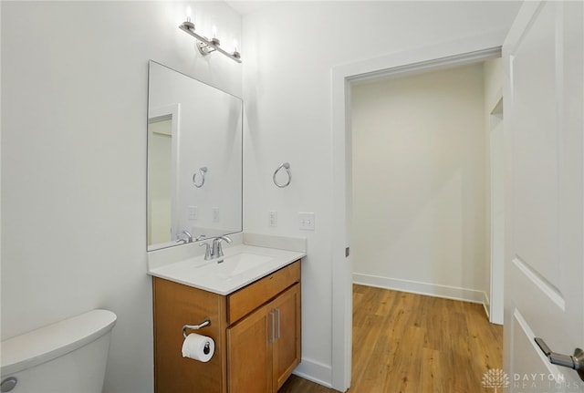 300 Grassy Creek Way, Washington Twp, OH 45458 - bathroom with vanity, toilet, wood finished floors, and baseboards