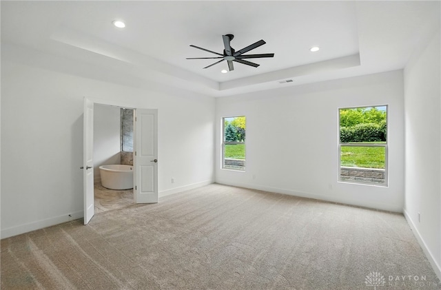 300 Grassy Creek Way, Washington Twp, OH 45458 - unfurnished bedroom featuring a tray ceiling, carpet floors, baseboards, recessed lighting, and connected bathroom