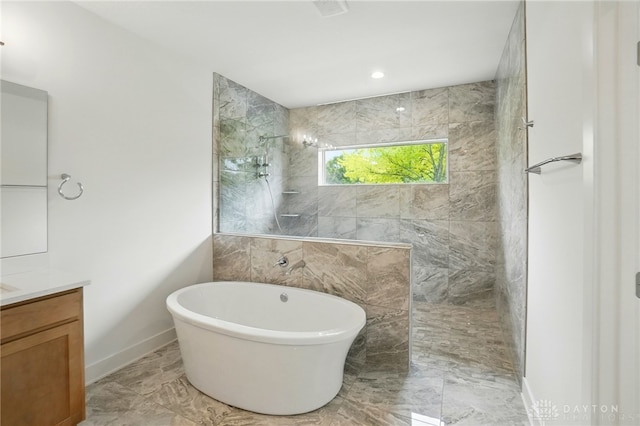 300 Grassy Creek Way, Washington Twp, OH 45458 - bathroom featuring a walk in shower, vanity, a freestanding bath, and marble finish floors