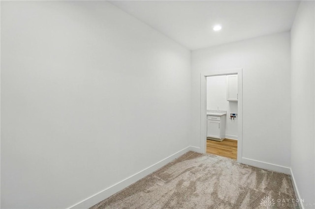 300 Grassy Creek Way, Washington Twp, OH 45458 - unfurnished room featuring light carpet, baseboards, and recessed lighting