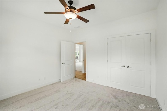 300 Grassy Creek Way, Washington Twp, OH 45458 - unfurnished bedroom featuring carpet, baseboards, a closet, and a ceiling fan