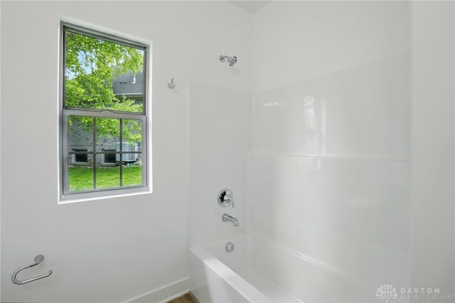 300 Grassy Creek Way, Washington Twp, OH 45458 - full bathroom featuring healthy amount of natural light, shower / bath combination, and baseboards
