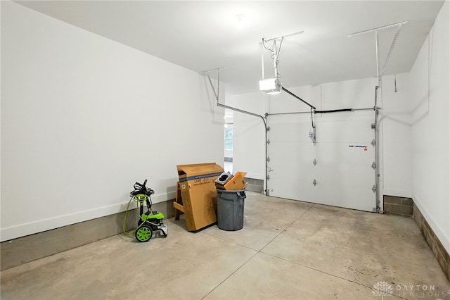 300 Grassy Creek Way, Washington Twp, OH 45458 - garage featuring a garage door opener and baseboards