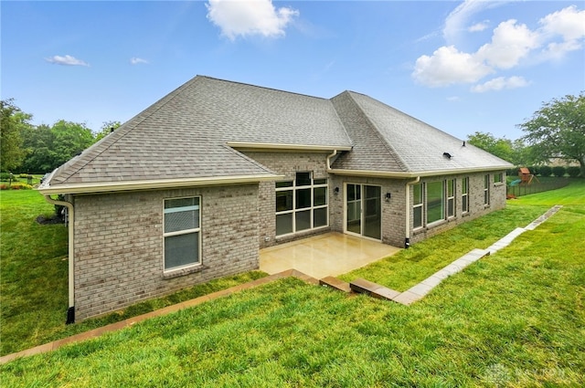 300 Grassy Creek Way, Washington Twp, OH 45458 - back of property with a patio area, a shingled roof, brick siding, and a yard