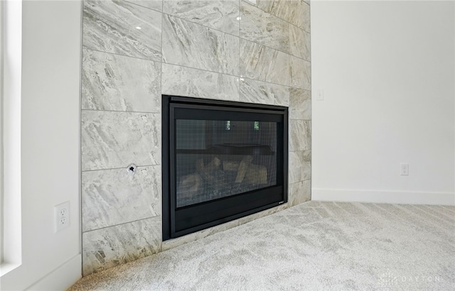 300 Grassy Creek Way, Washington Twp, OH 45458 - detailed view of a tile fireplace, carpet floors, and baseboards