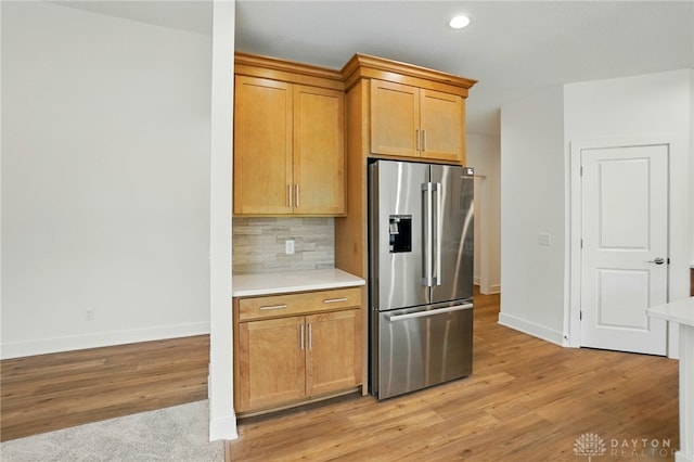 300 Grassy Creek Way, Washington Twp, OH 45458 - kitchen featuring stainless steel fridge with ice dispenser, baseboards, light countertops, light wood-style floors, and recessed lighting