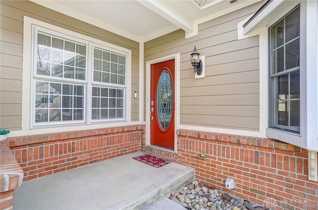 doorway to property with a porch