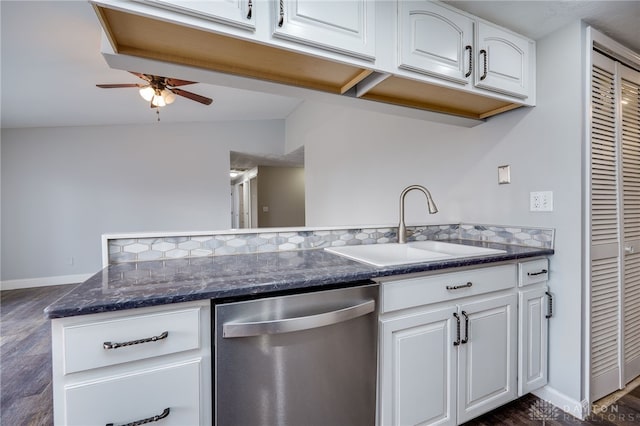 kitchen featuring white cabinetry, dishwasher, and sink