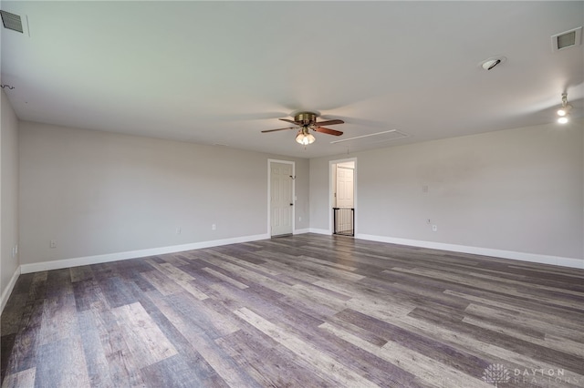 empty room featuring hardwood / wood-style floors and ceiling fan