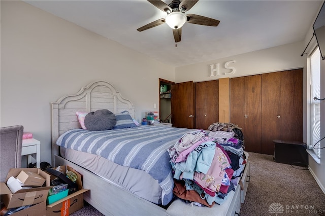 bedroom with ceiling fan and carpet flooring