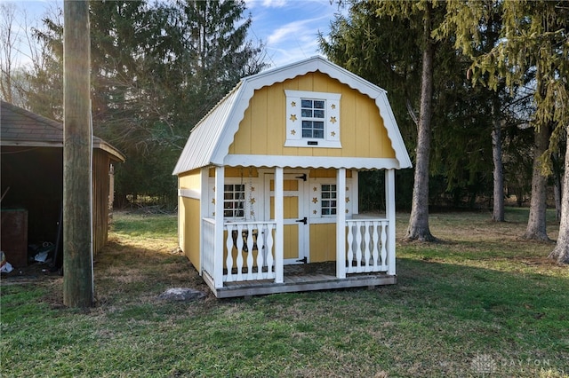 view of outdoor structure with a lawn