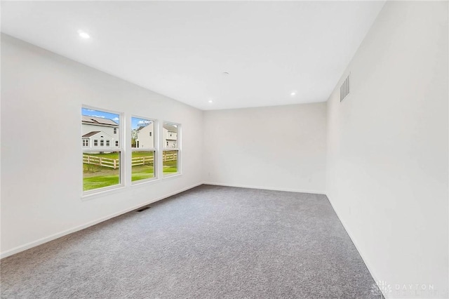 view of carpeted spare room