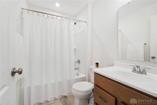 full bathroom featuring vanity, toilet, and shower / bath combo