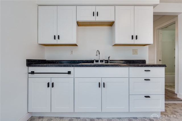 kitchen with white cabinets