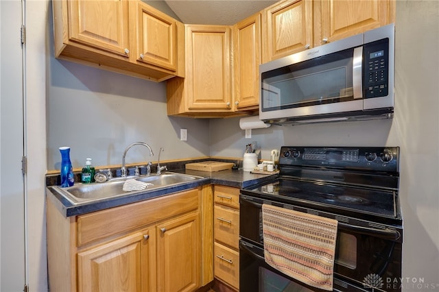 kitchen featuring double oven range and sink