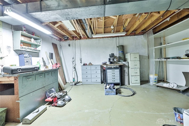 basement with a workshop area