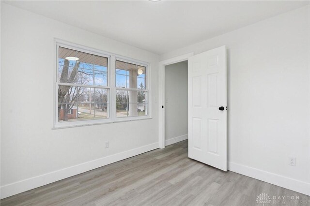 unfurnished bedroom with light hardwood / wood-style flooring