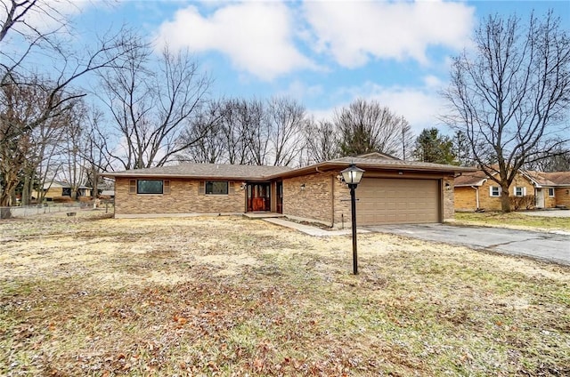 ranch-style home with a garage