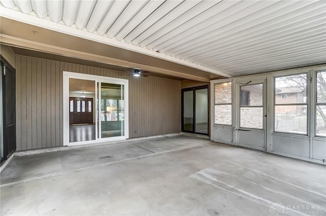 unfurnished sunroom with plenty of natural light