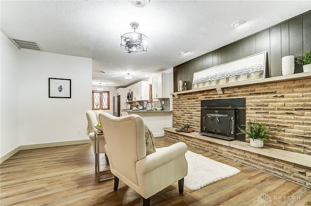 living room with light hardwood / wood-style flooring