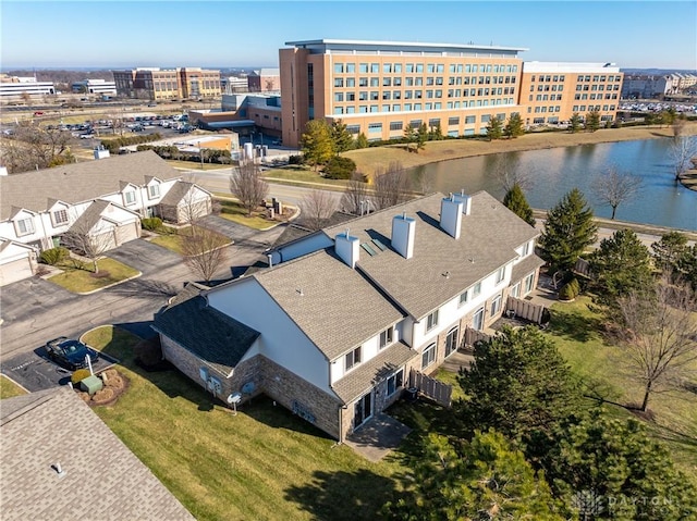 drone / aerial view featuring a water view