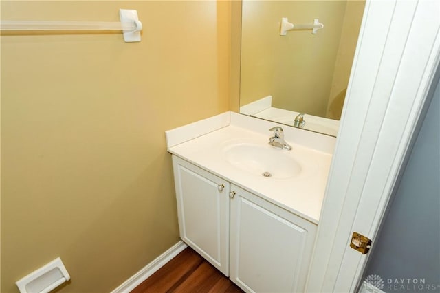 bathroom featuring vanity and wood-type flooring