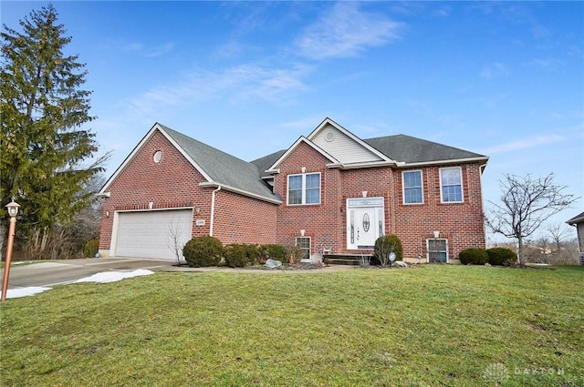 view of front facade with a garage and a front lawn