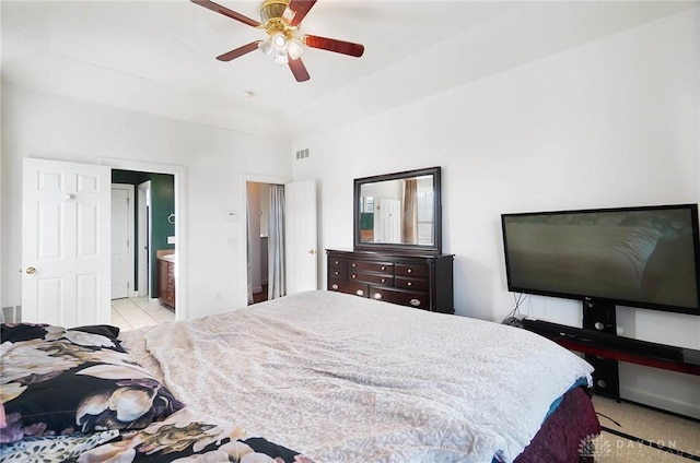 bedroom with ceiling fan and ensuite bathroom