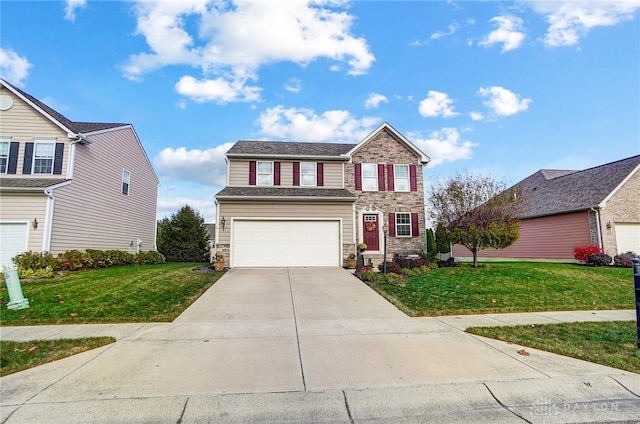 view of front of home with a garage and a front yard