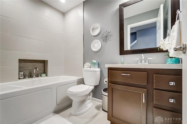 bathroom featuring vanity, toilet, and a bathtub