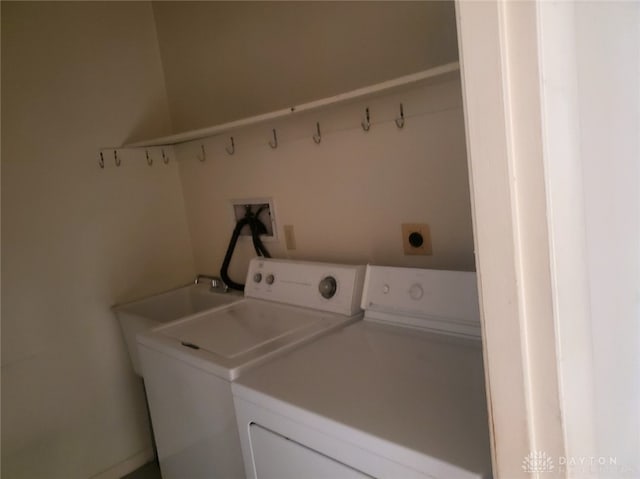 laundry room with washer and clothes dryer