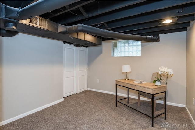 basement with carpet flooring